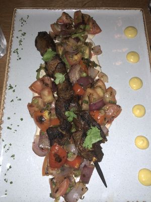 Steak in a platter at Four One Six (416) in Tel Aviv