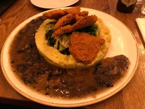 Mushroom Shnitzel with mashed potatoes,  greens and mushroom gravy at Four One Six (416) in Tel Aviv