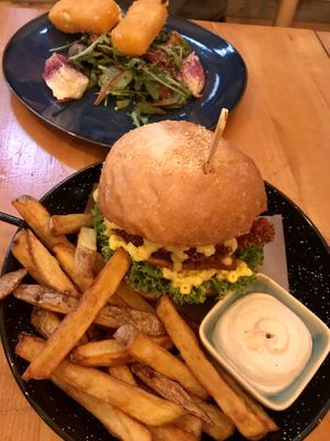 Mac’n’cheese burger with seitan & cheese sticks with potato salad  at Balans Bistro in Bratislava