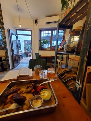 Rear dining area and patio outside. Patio was full of smokers so that meant, with the door kept open, indoor diners get to breathe-in cigarette smoke with their meals. (Vegan and s at Balans Bistro in Bratislava