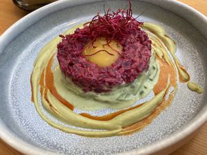 Vegan tatar ”biftek” (beetroot+nuts+mango and avocado cream) highlight of this starter was homemade bread, so delicious!  at Balans Bistro in Bratislava