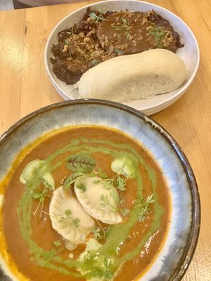 Tomato soup with ravioli and seitan steak  at Balans Bistro in Bratislava