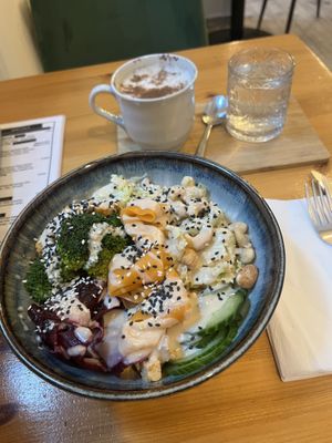One of the bowls and a dirty chai latte.   at Balans Bistro in Bratislava