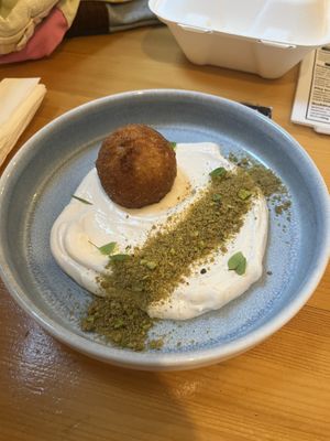 Their fried sweet ball with “Nutella” inside and a lemon mascarpone cream sprinkled with pistachios    at Balans Bistro in Bratislava