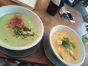 green pea soup and tom yum soup at Balans Bistro in Bratislava