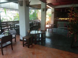 Sitting area and bar at Reform Kafe in Chiang Mai