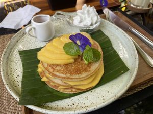 Homemade gluten-free pancakes with mango, 150 baht  at Reform Kafe in Chiang Mai