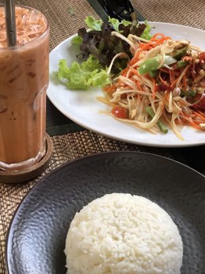 Thai tea, Somtam, rice  at Reform Kafe in Chiang Mai