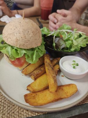 Khao Soi Burger with extra cashew cheese at Reform Kafe in Chiang Mai