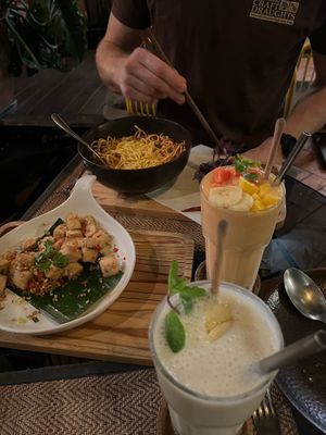 Spicy tofu, khao soi, mango lassi and Gour seasons smoothie   at Reform Kafe in Chiang Mai