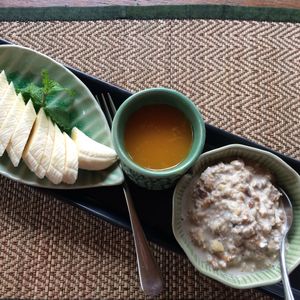 brekkie - banana, OJ, and bircher muesli in rice milk at Reform Kafe in Chiang Mai