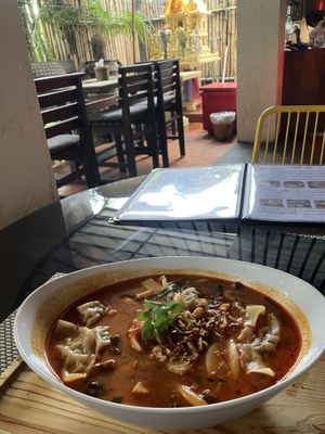 Tom Yam with mushroom dumplings   at Reform Kafe in Chiang Mai