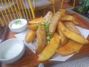 Curry wedges - 6/10 - great portion size but would prefer more crispy and better flavour at Reform Kafe in Chiang Mai