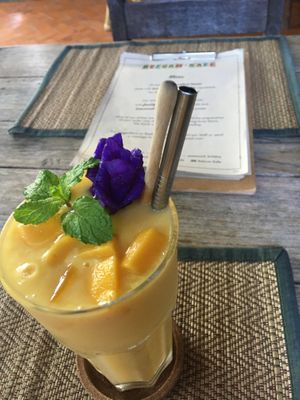 Mango smoothie. They use metal straws to avoid plastic. at Reform Kafe in Chiang Mai