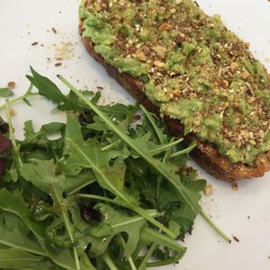 Toast avocado with dukka at Nourish Cafe at Island Yoga in Palm Beach