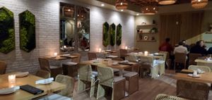 Beautiful seating indoor that opens to outside table's at Harvest Seasonal Grill & Wine Bar in North Wales