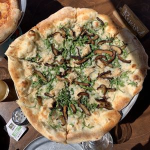 Mr. White pizza with cashew ricotta, arugula, and shiitake bacon at Piante Pizzeria in Breckenridge