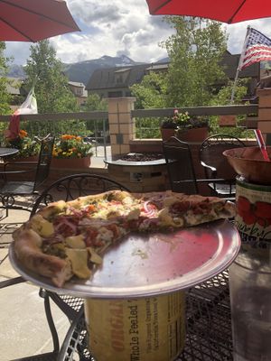Pesto pizza! Kale pesto sauce with artichoke red onion and sun dried tomatoes  at Piante Pizzeria in Breckenridge