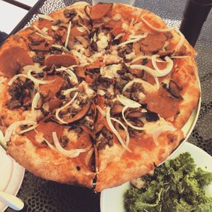 Where’s the Meat pizza with shiitake bacon and Kale Caesar salad.  at Piante Pizzeria in Breckenridge