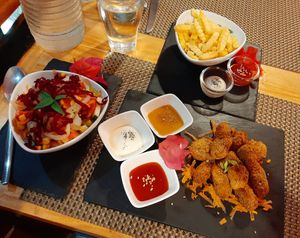 Veggie Nuggets served with french fries & side salad. at Luna Rossa in Panglao