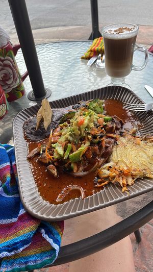 Vegan rancheros and an almond milk capuccino  at Amparos in Cozumel