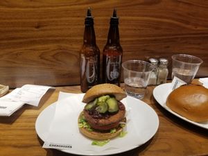 Vegan Special - tofu patty with red pepper and orange chutney and avocado. Pickles were an extra euro. at Bacoa - San Jeronimo in Madrid