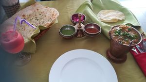 178.000 Dong. Garlic Naan 48.000, Watermelon juice 48.000, mixed vegetables curry 80.000 at Ganesh Indian Restaurant in Nha Trang