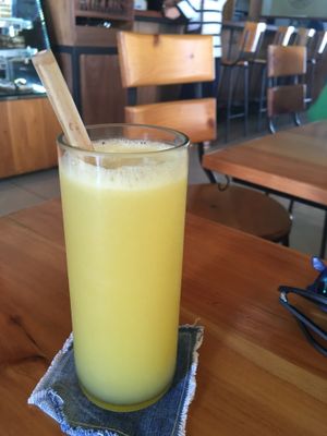 Orange juice with wooden straw - they are conscious about plastic straws 🙂 at Kokkos Cafe Bistro in Diani