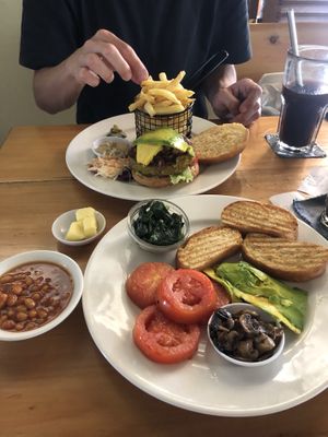 Breakfast and veggie burger. (Came with butter but can be without)  at Kokkos Cafe Bistro in Diani