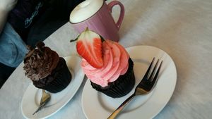 Vegan chocolote cupcake and strawberry cupcake with soymilk cappuccino  at Pink Ribbon Cupcakes in Hamburg