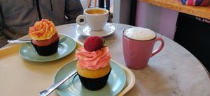 Red velvet cupcake and strawberry with coffee at Pink Ribbon Cupcakes in Hamburg