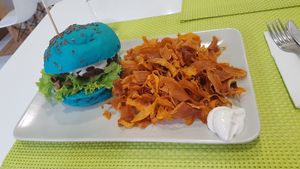 Musheoom and bean burger on spirulina bun at Vegana Burgers - Cais do Sodre in Lisbon