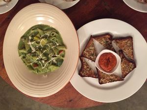 Almond pesto penne with garlic toast.  at Birdsong Organic Cafe Shop in Mumbai