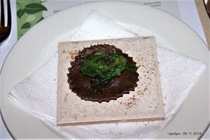 Carob ravioli stuffed with tahini and cashew nuts puree
served with seaweed salad and black sesame seeds. at O'Vrakas Taverna in Limassol