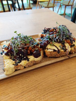 Spicy Pumpkin toast with Pumpkin 'Ricotta',  roasted beet and chickpeas, hemp seed, micro veggies, balsamic glaze and lemon zest. at O'YO - Brabantdam in Ghent