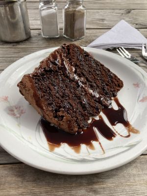 Chocolate cake with frosting and chocolate sauce  at Goathland Tea Room & Gifts in Whitby