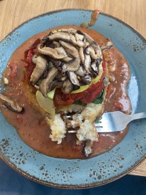 Grit cake itself was a little under-seasoned but the gravy and veggies were 10/10    at Early Girl Eatery in Asheville