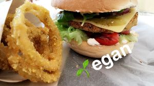 Onion rings and falafel burger  at Chutnej in Vinohrady