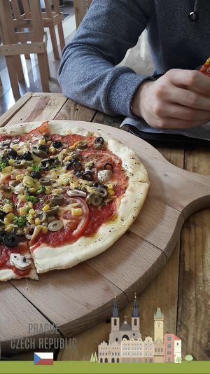 Olive pizza at Chutnej in Vinohrady