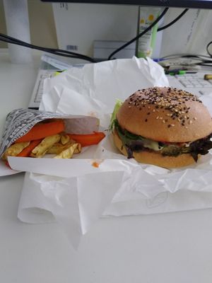 Super tasty brocoli burger and vegetable fries, available to be delivered via damejidlo.cz at Chutnej in Vinohrady