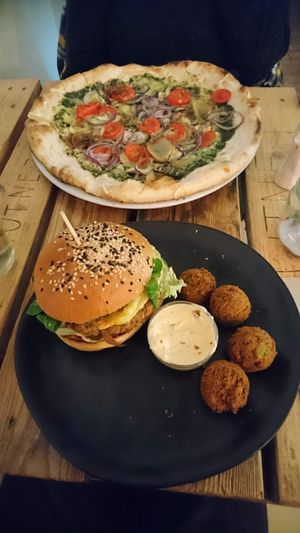 Scorpion burger, falafel balls and yummy pizza 😋 at Chutnej in Vinohrady