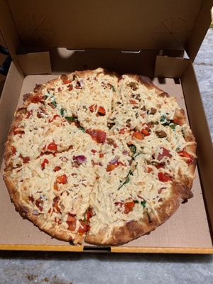 Create your own pizza with extra cheese, veggies, half pepperoni and half beyond beef crumbles.  at Panago Pizza in Regina