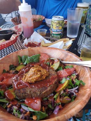 Lentil burger salad with homemade mustard. at Brews Brothers in Galveston