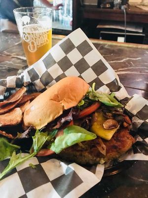 " vegan patty made with lentils, carrots, and the works. It was pretty good! I got my burger with arugula, tomato, grilled onions, grilled mushrooms, grilled pineapple." at Brews Brothers in Galveston