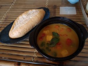 Fruit curry (green and red pepper, carrot, potato and sweet potato) served with bred or rice at Yen Nha Hang Chay & Yoga in Nha Trang