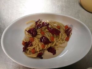 Spaghettoni mantecati con olio e rosmarino su crema di fagioli borlotti at Le Notti di Cabiria in Brescia
