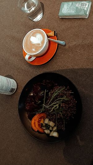 Beet carpacchio with quinoa and coconut milk cappuccino at Kuusk Hernesto in Tallinn