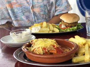Homemade lasagne and lentil burger  at Cafe Bonjour in Lanzarote