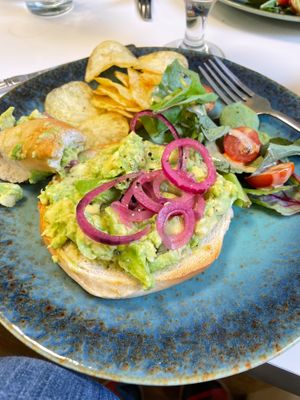 Avocado and pickled red onion bagel  at Let's Toast Coffee House in Okehampton