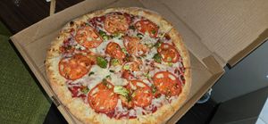 Vegan Mozarrella with Brocolli and fresh tomatoes 🍅 😋 at Specialty Pizza in Altamonte Springs